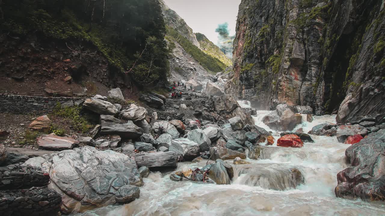 time lapse footage of clouds moving over a himalayan river
