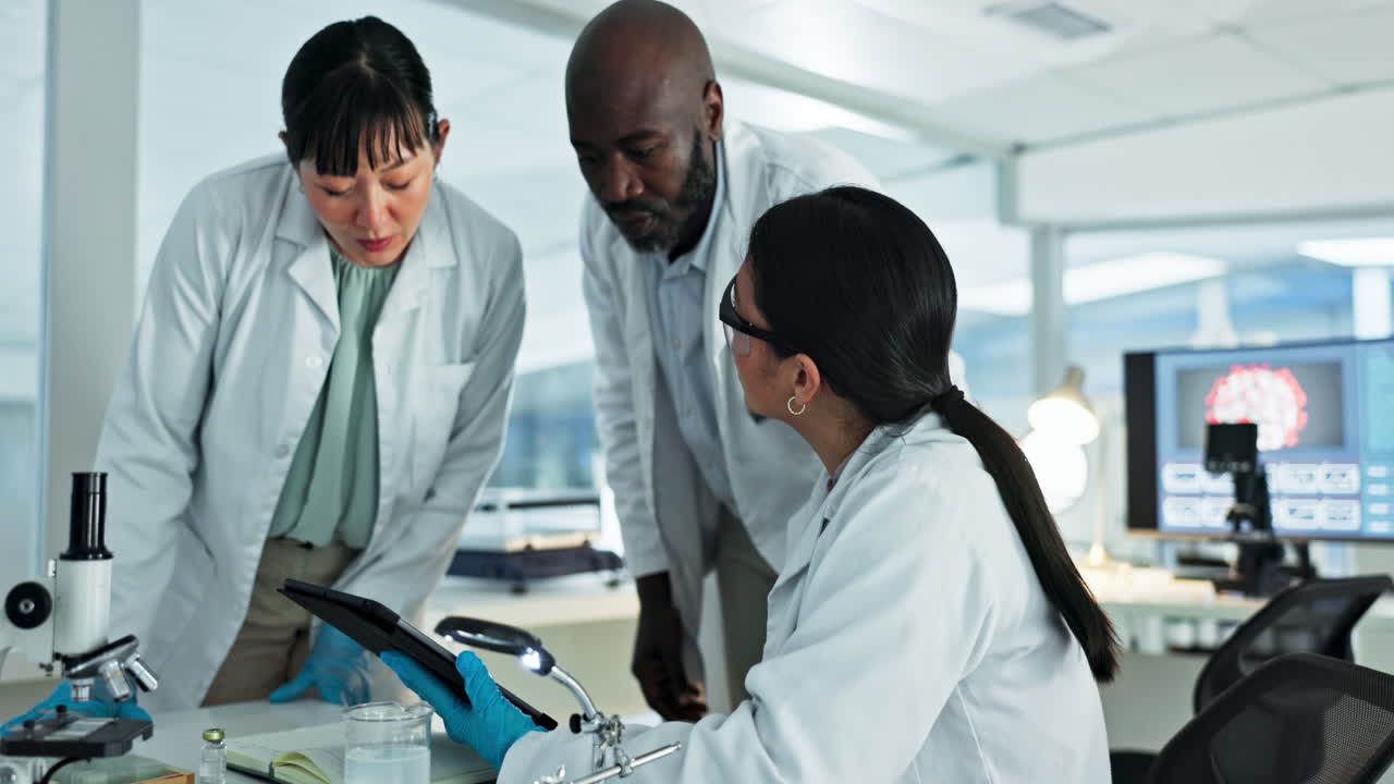 Tablet, teamwork or scientists reading