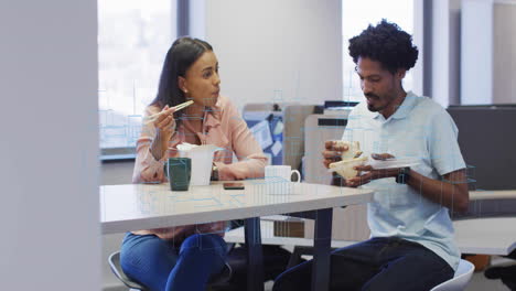 in office, two people eating lunch with animation of architectural sketches overlay