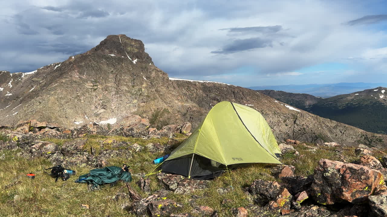 Camping tent backpack mount of the Holy Cross peak 14er summer early morning Rocky Mountain Sawatch Range Peak Colorado high alpine tundra landscape Notch Mountain Shelter Halo Ridge trail static