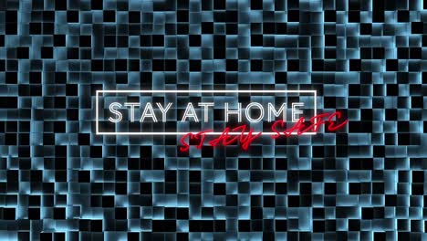 Animation-of-neon-white-and-red-words-Stay-At-Home-Stay-Safe-in-a-frame-over-blue-squares