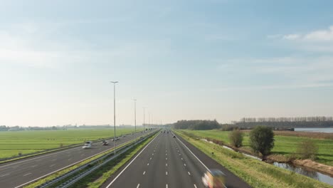 wide angle time lapse of busy highway traffic, transport infrastructure