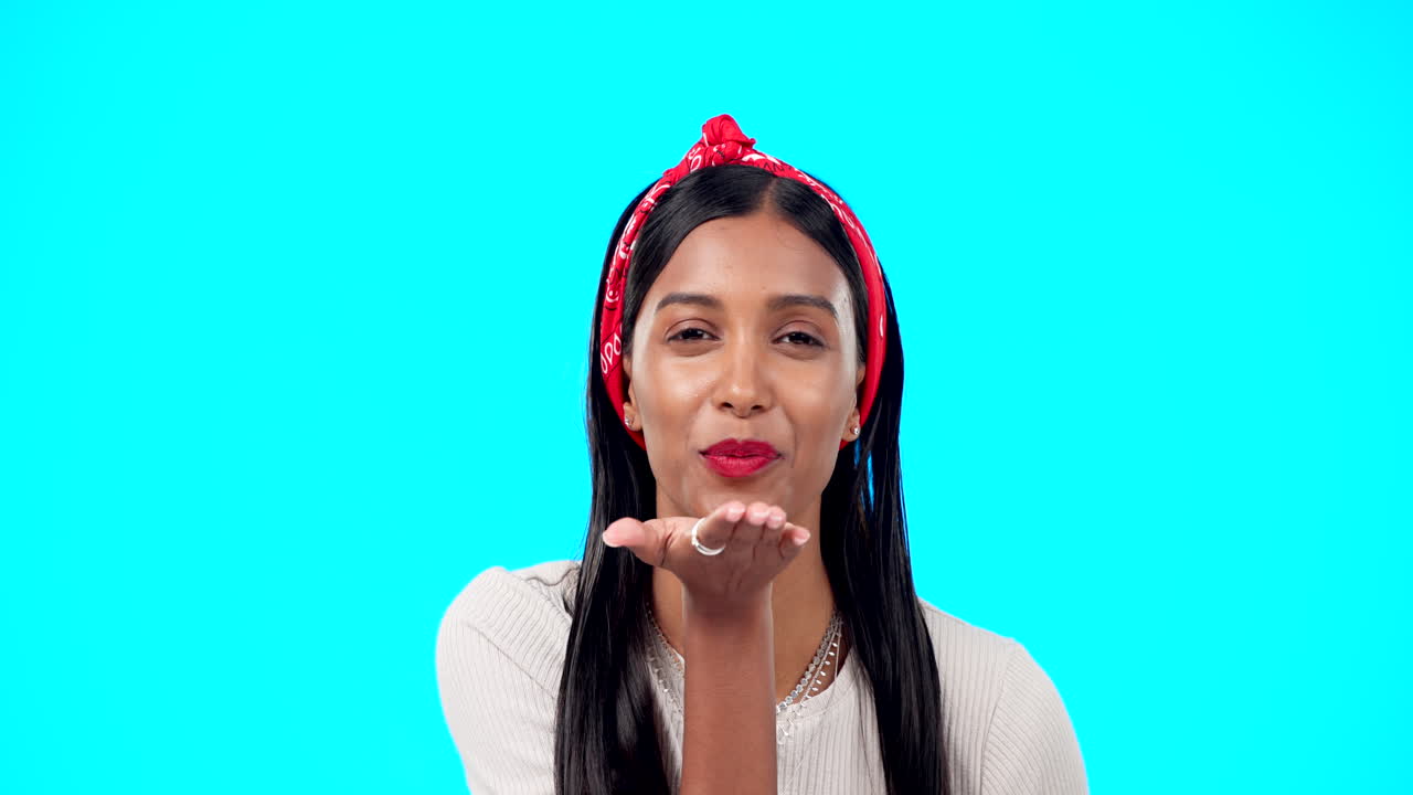 Woman, face and blowing kiss with lipstick