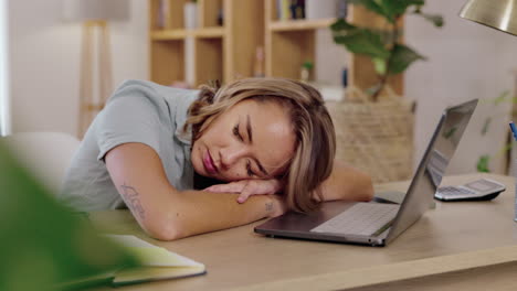 Asian-woman,-sleeping-and-laptop-on-desk-in-remote