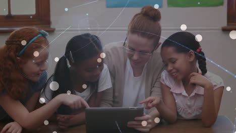 Animation-of-shapes-over-happy-caucasian-female-teacher-with-diverse-schoolchildren-using-tablet
