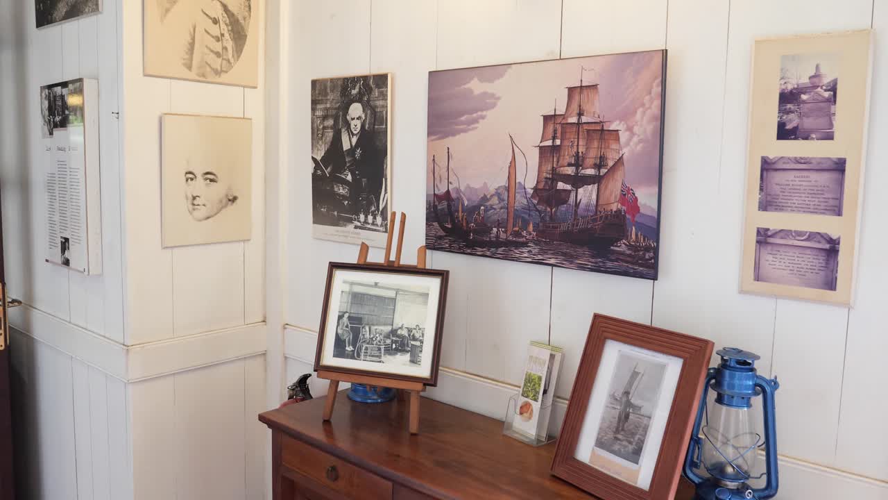 Historical Museum Exhibit: Portraits, Ship Paintings, and Antique Photographs