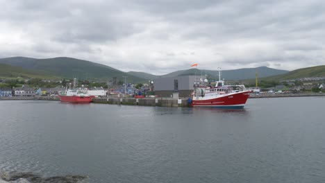 boats docked at dingle marina in kerry, ireland