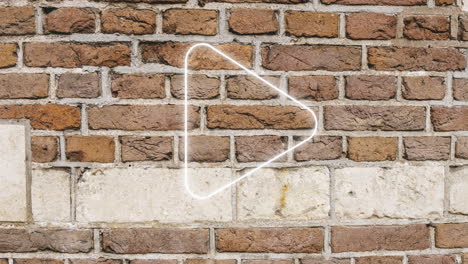 animation of glowing neon arrow icon on brick wall