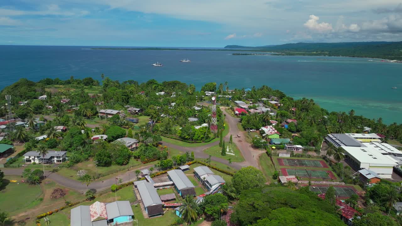 Morning Boram road Wewak Hill port peninsula morning summer dry season fog Wewak costal town aerial drone Papua New Guinea PNG Dogreto Bay panoramic ocean view Inn Boutique Hotel village backwards