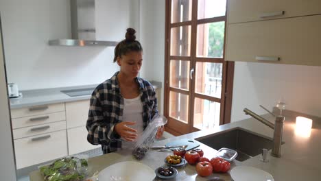 woman preparing food in kitchen