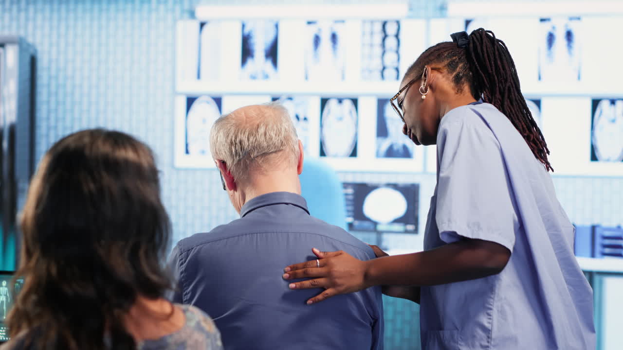 Vertical Video African american specialist evaluates the body posture of old man