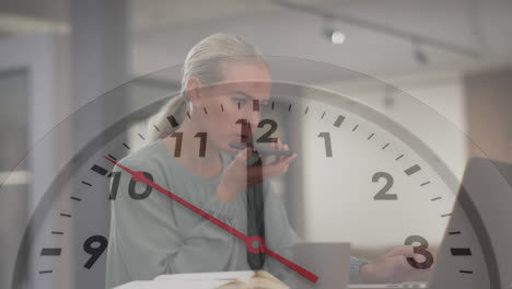 animation of ticking clock against caucasian woman talking on smartphone at office