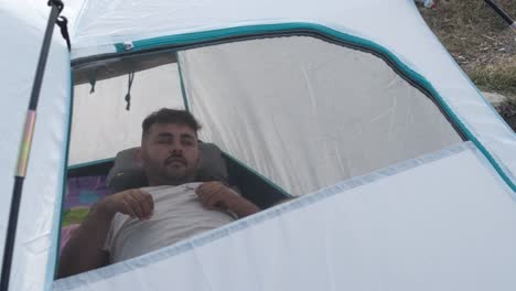 Young-Man-Sleeping-Tent