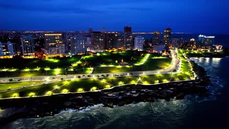 aerial orbit of san martin urban waterfront park at night, mar del plata, argentina