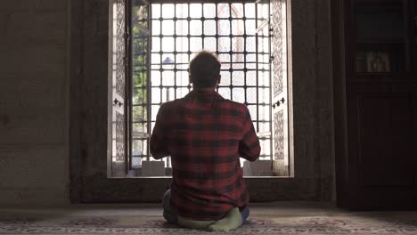 muslim teenager in the historical mosque.