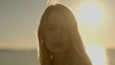 woman at sunrise by the sea