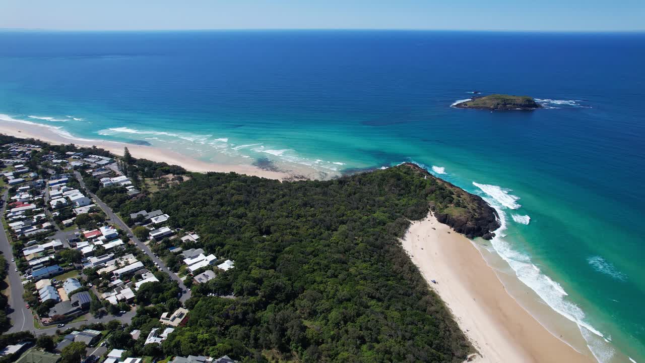 Above View Of Fingal Head Village With Off-shore Cook Island In New South Wales, Australia. Aerial Drone Shot