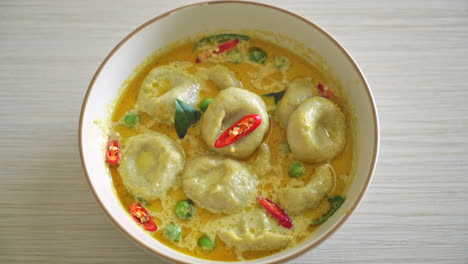 green curry soup with fish ball - thai food style