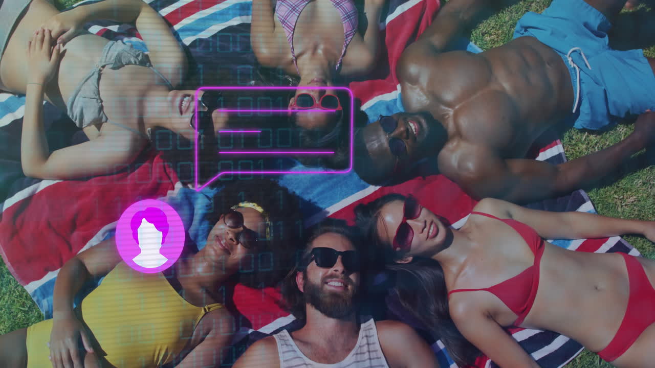 Animation of diverse friends relaxing on grass with social media icons overlay