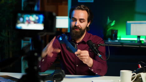 man excited to promote newly launched music listening devices