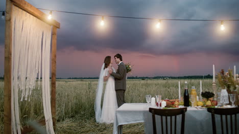 young couple in love in a fall field