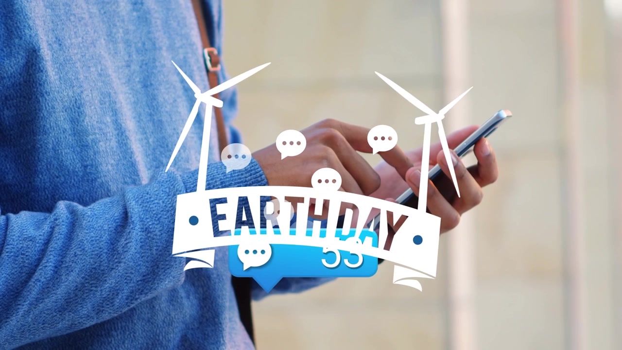 Speech bubble and earth day text banner against mid section of a man using smartphone