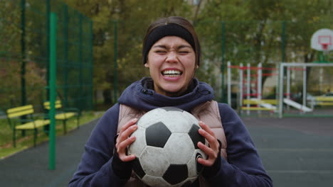 Woman-shouting-with-soccer-ball