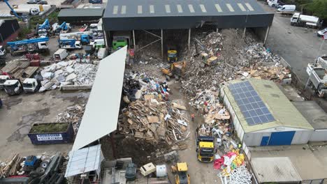 recycling plant essex uk aerial footage skip lorries unloading rubbish