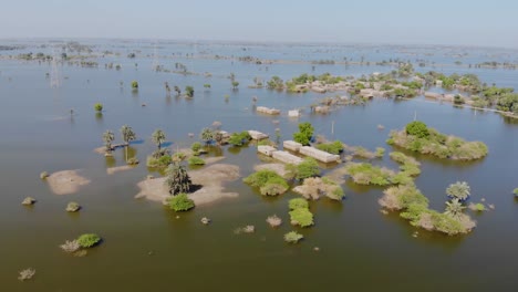 Aerial-View-Of-Large-Swathes-Of-Land-Under-Flood-Water-In-Jacobabad,-Pakistan