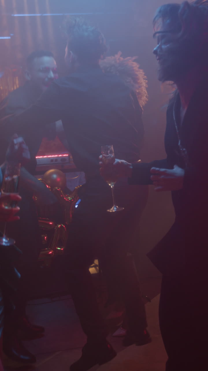 People Dancing and Celebrating at a Disco Party