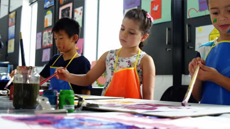 animation of falling hearts over group of diverse children painting