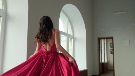 Woman in a Red Satin Gown