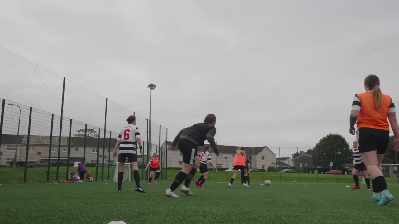 Team is on the field, hearts beat fast, Warming up strong, moment’s vast