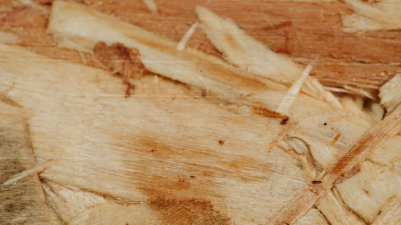 Close-up view of wood chip board texture