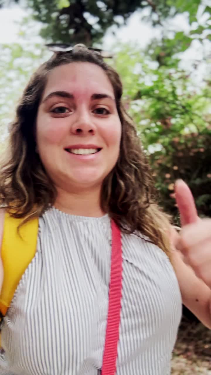 Young Woman Looking Up with an Expression of Awe and Wonder