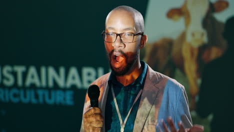 man giving a presentation on sustainable agriculture