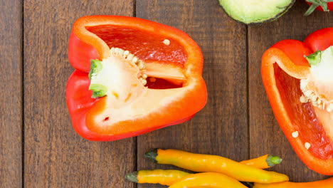 animation of close up of vegetables on wooden background