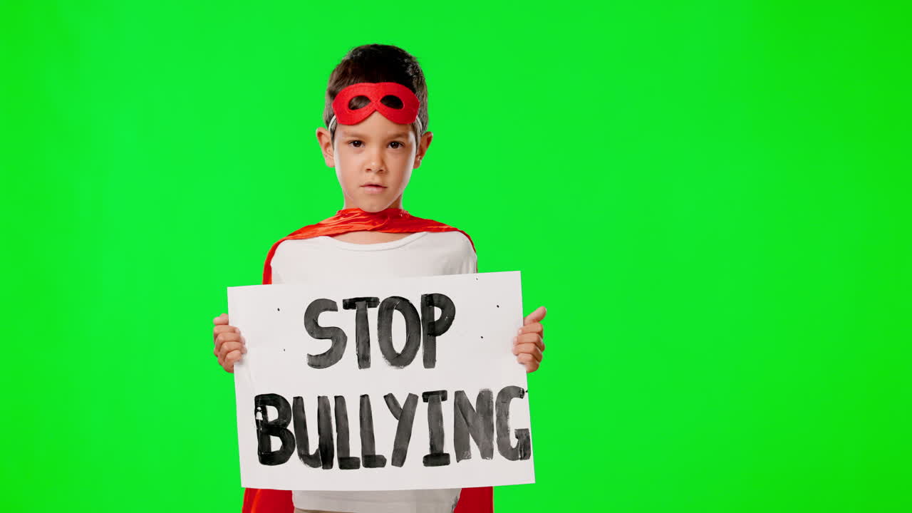 Boy child, protest and stop bullying by green