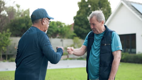 senior men, fist bump and support of friends