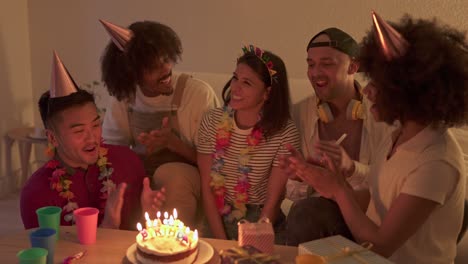 diverse group of friends celebrating a birthday party