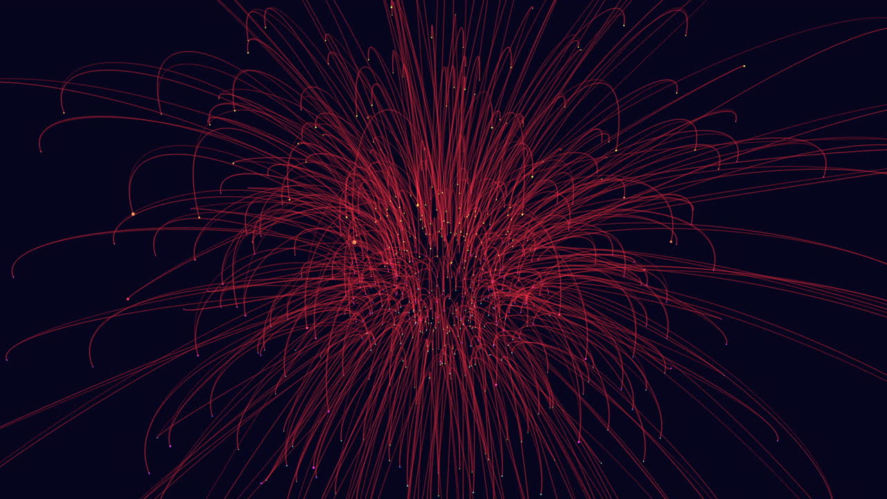Explosive red fireworks illuminate the night sky