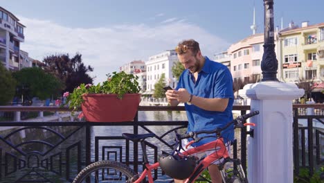 young man texting on the phone.