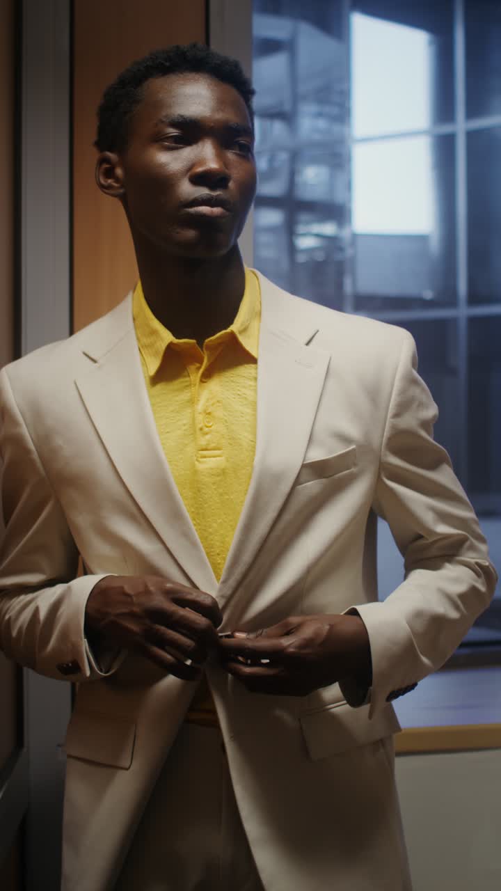 Stylish Man in Suit Poses Indoors