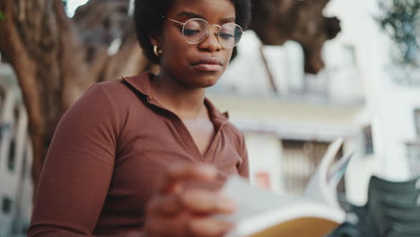 young dark-haired female student studying outdoor