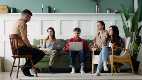 study group sitting on sofa and chairs