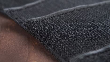 black textured velcro with fabric fastening tapes