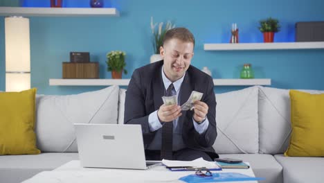 home office worker man making money and feeling happy.