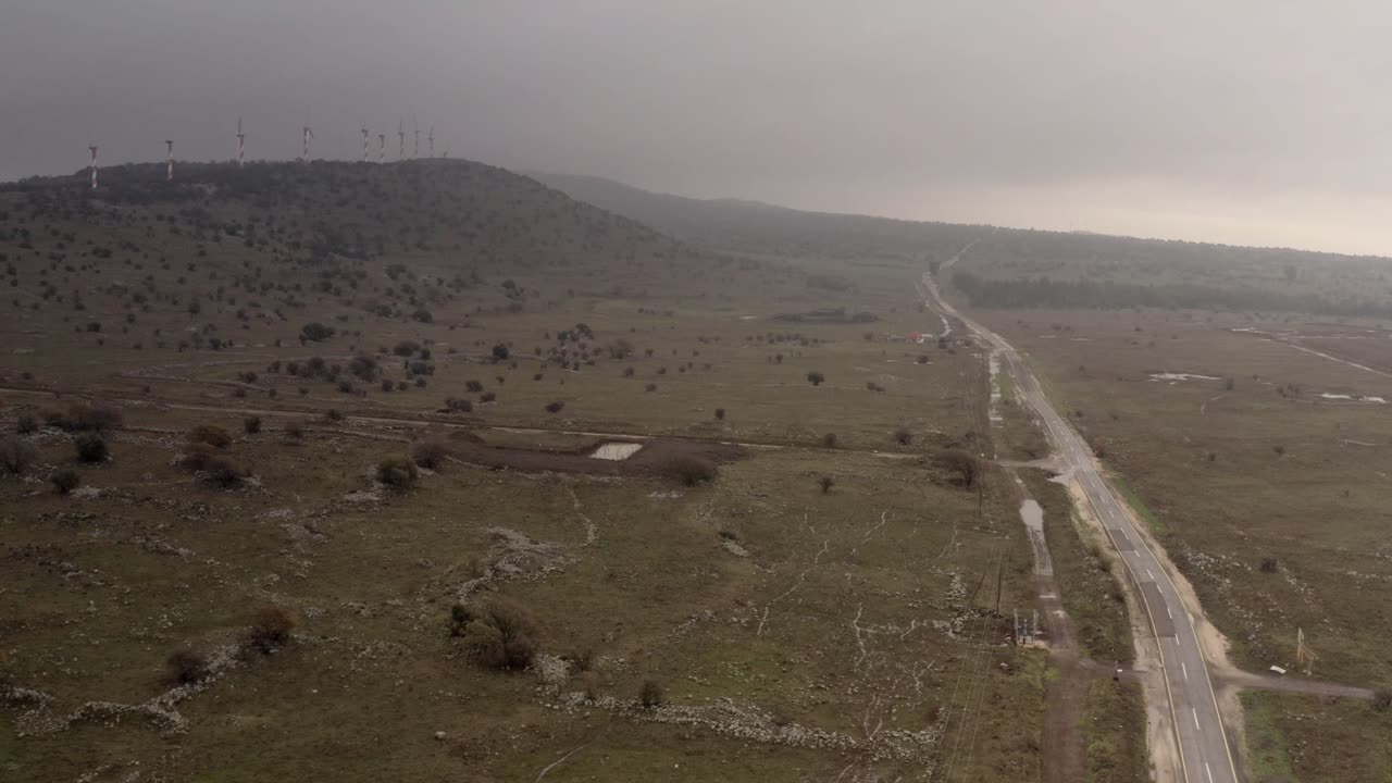 Panoramic View of a Rural Landscape with Wind Turbines