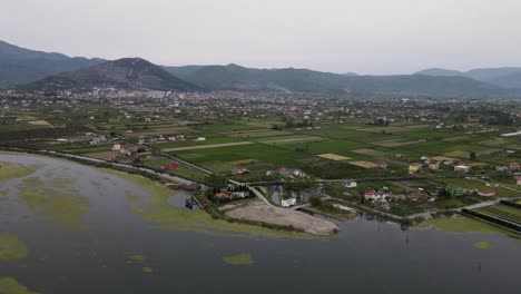 Beautiful-coastline-agains-mountains,-Lezha,-Albania.-Aerial-view