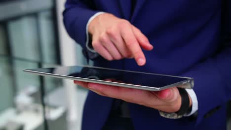 businessman using digital tablet in office